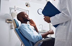 Man smiling at the dentist
