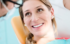 Smiling woman in dental chair