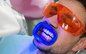 Man receiving teeth whitening