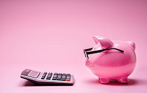 Piggy bank and calculator