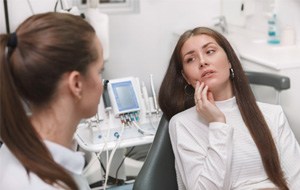 woman with implant pain 