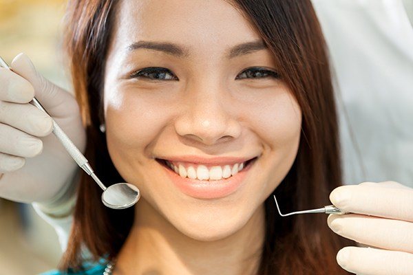 woman sitting in dental chair