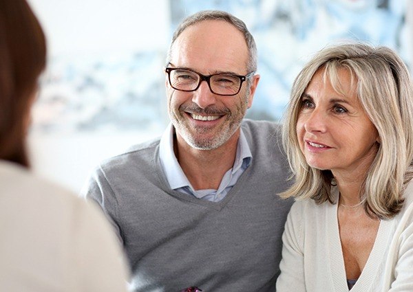 Couple consulting with the dentist 