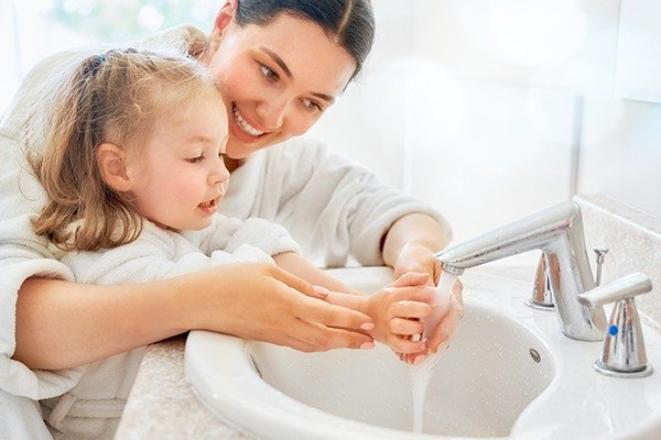 Women washing hands