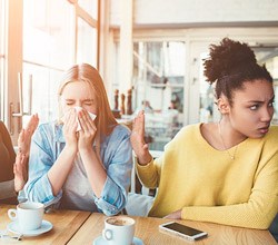 Woman Sneezing