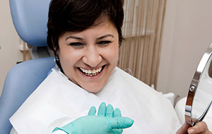 Smiling woman in dental chair