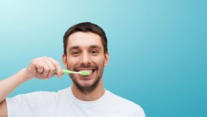 Man brushing teeth