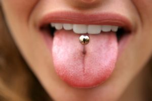 person with tongue piercing 