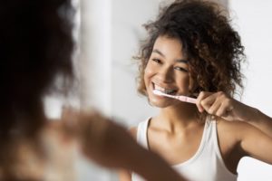 Woman brushing her teeth