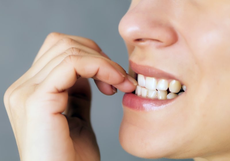 Biting nails