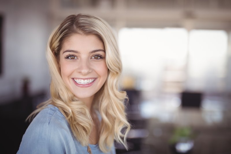 Woman smiling with straight, white teeth