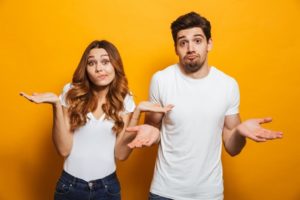 puzzled man and woman